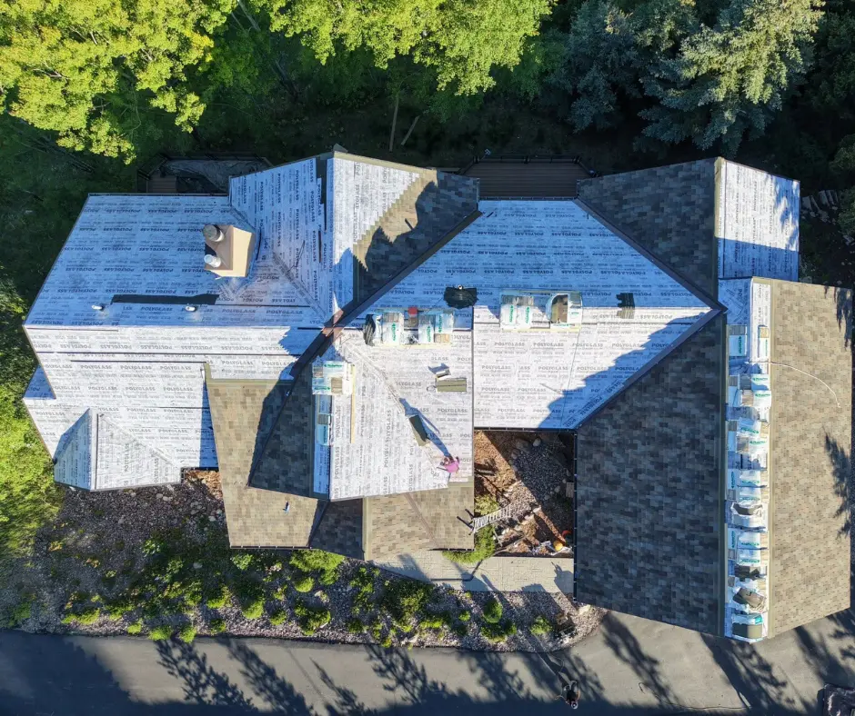 Full roof replacement with new asphalt shingles installed on a Bozeman, Montana home